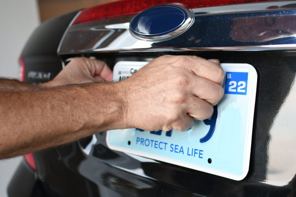 attaching a vehicle registration license plate to a car so it is legal to drive on the road